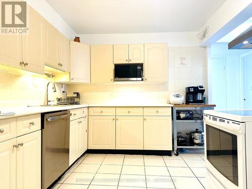 1018 - 75 Bamburgh Circle, Toronto (Steeles), ON - Indoor Photo Showing Kitchen