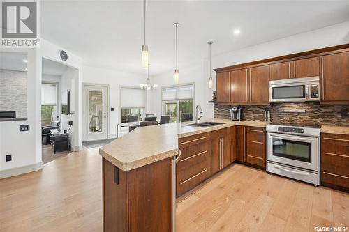 102 Milne Crescent, Saskatoon, SK - Indoor Photo Showing Kitchen With Double Sink With Upgraded Kitchen