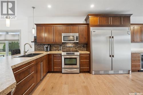 102 Milne Crescent, Saskatoon, SK - Indoor Photo Showing Kitchen With Double Sink