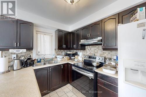 69 Red Maple Drive, Brampton (Brampton West), ON - Indoor Photo Showing Kitchen With Double Sink