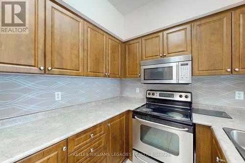 13 - 3029 Finch Avenue W, Toronto (Humbermede), ON - Indoor Photo Showing Kitchen