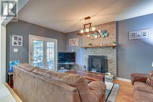 Family Room/Fireplace - 100 Midale Crescent, London, ON - Indoor Photo Showing Living Room With Fireplace