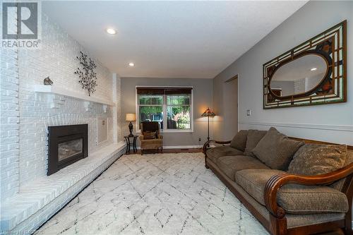 593 4Th Street A W, Owen Sound, ON - Indoor Photo Showing Living Room With Fireplace