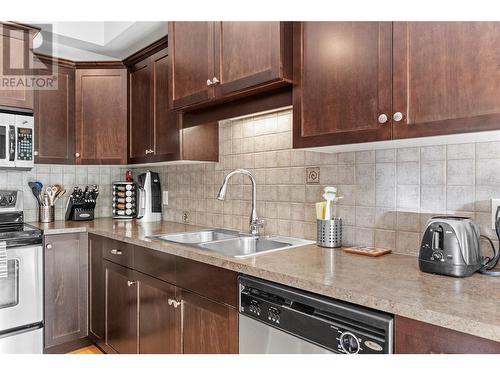 4900 Heritage Drive Unit# 303, Vernon, BC - Indoor Photo Showing Kitchen With Double Sink