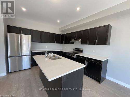 34 - 3600 Southbridge Avenue S, London, ON - Indoor Photo Showing Kitchen With Stainless Steel Kitchen With Double Sink