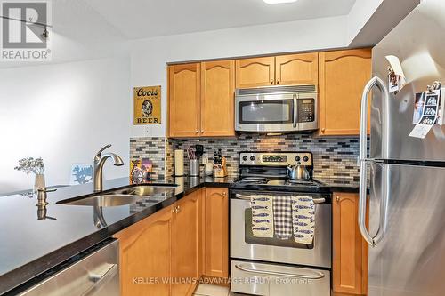 516 - 51 Lower Simcoe Street, Toronto (Waterfront Communities), ON - Indoor Photo Showing Kitchen With Stainless Steel Kitchen With Double Sink