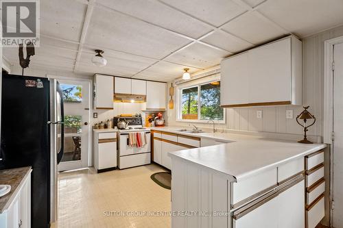 431 Healey Lake, The Archipelago, ON - Indoor Photo Showing Kitchen With Double Sink