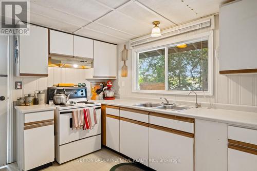 431 Healey Lake, The Archipelago, ON - Indoor Photo Showing Kitchen With Double Sink