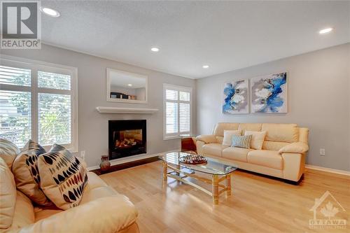 122 Marshfield Street, Ottawa, ON - Indoor Photo Showing Living Room With Fireplace