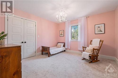 Large bedroom with double closet, one of SIX bedrooms on the second floor - 6548 Carp Road, Ottawa, ON - Indoor Photo Showing Bedroom