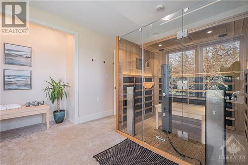 This bedroom currently being utilized as a wellness centre, a space to unwind after a busy day - 6548 Carp Road, Ottawa, ON - Indoor Photo Showing Other Room