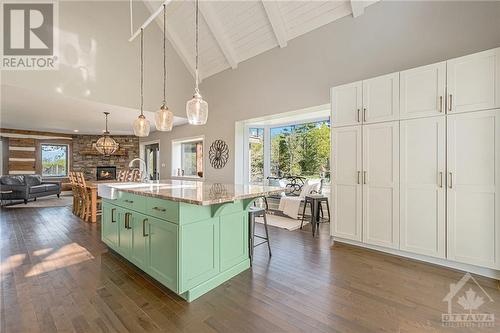 Watch over the river and enjoy the variety of birds that visit the feeder just outside the window - 6548 Carp Road, Ottawa, ON - Indoor Photo Showing Kitchen With Upgraded Kitchen