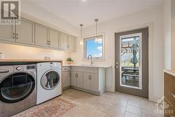 Large laundry room with terrific storage - 