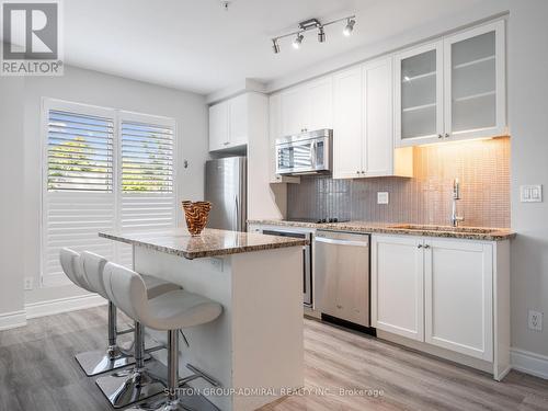 101B - 9090 Yonge Street, Richmond Hill (South Richvale), ON - Indoor Photo Showing Kitchen With Upgraded Kitchen