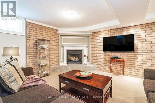 187 Sproule Drive, Barrie, ON - Indoor Photo Showing Living Room With Fireplace