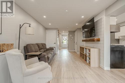 26 Monarchy Street, Barrie (Innis-Shore), ON - Indoor Photo Showing Other Room With Fireplace