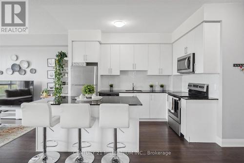 310 - 65 Yorkland Boulevard, Brampton, ON - Indoor Photo Showing Kitchen With Stainless Steel Kitchen With Upgraded Kitchen