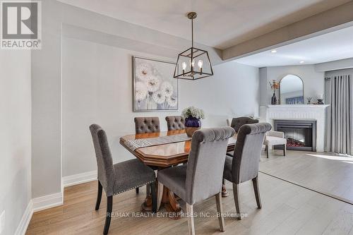 48 - 2155 South Millway, Mississauga, ON - Indoor Photo Showing Dining Room With Fireplace