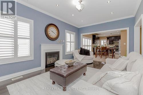 97 Royal West Drive, Brampton, ON - Indoor Photo Showing Living Room With Fireplace