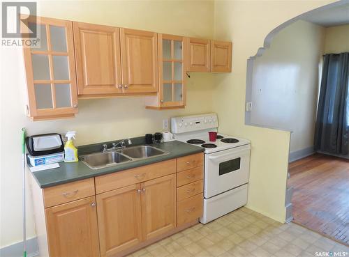 1214 G Avenue N, Saskatoon, SK - Indoor Photo Showing Kitchen With Double Sink