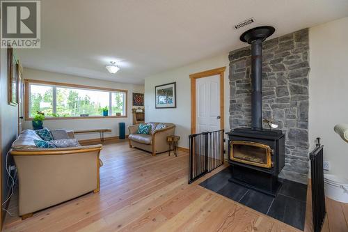 51795 Guest Road, Cluculz Lake, BC - Indoor Photo Showing Living Room With Fireplace