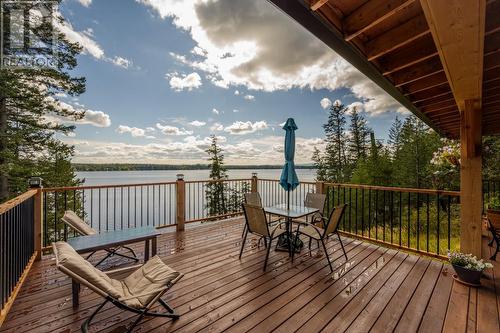 51795 Guest Road, Cluculz Lake, BC - Outdoor With Body Of Water With Deck Patio Veranda With View With Exterior