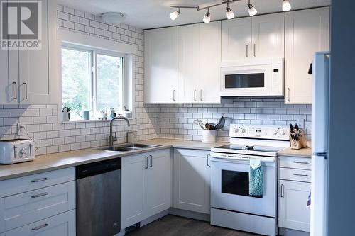 8255 Flamingo Road, Prince George, BC - Indoor Photo Showing Kitchen With Double Sink