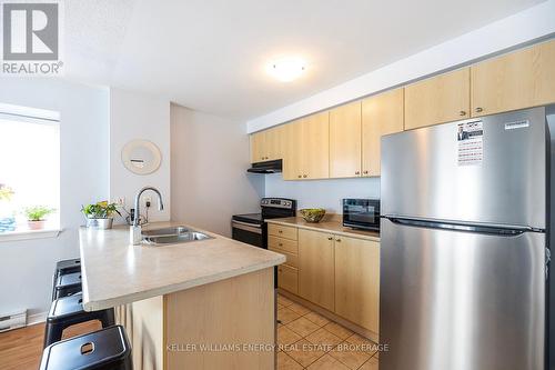 301 - 91 Aspen Springs Drive, Clarington (Bowmanville), ON - Indoor Photo Showing Kitchen With Double Sink