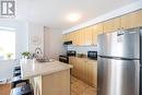 301 - 91 Aspen Springs Drive, Clarington (Bowmanville), ON  - Indoor Photo Showing Kitchen With Double Sink 