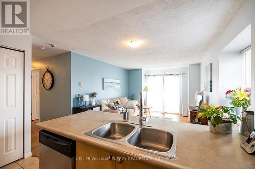 301 - 91 Aspen Springs Drive, Clarington (Bowmanville), ON - Indoor Photo Showing Kitchen With Double Sink