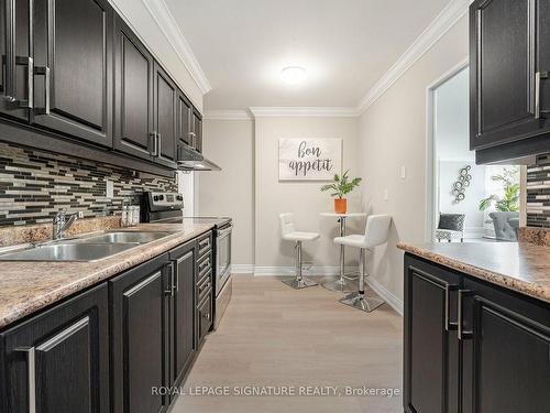 319-551 The West Mall, Toronto, ON - Indoor Photo Showing Kitchen With Double Sink