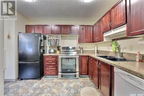 47 Laverendrye Way, Regina, SK - Indoor Photo Showing Kitchen With Double Sink