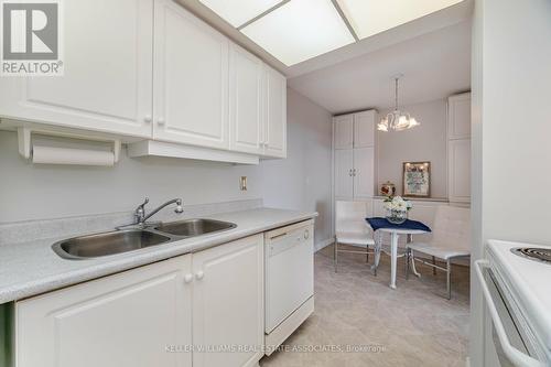 914 - 1333 Bloor Street, Mississauga (Applewood), ON - Indoor Photo Showing Kitchen With Double Sink