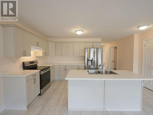 16 Braeburn Street, Brighton, ON - Indoor Photo Showing Kitchen With Double Sink