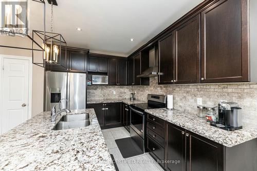 51 Prady Lane, New Tecumseth, ON - Indoor Photo Showing Kitchen With Double Sink With Upgraded Kitchen