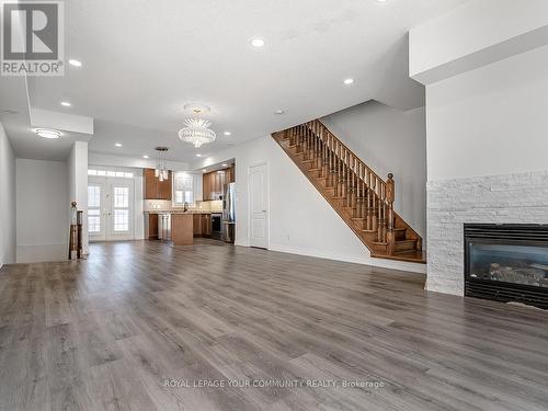 54 Cathedral High Street, Markham (Cathedraltown), ON - Indoor Photo Showing Living Room With Fireplace