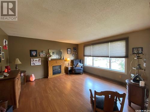 139 Stewart Crescent, Kindersley, SK - Indoor With Fireplace