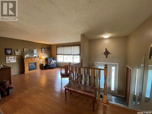 139 Stewart Crescent, Kindersley, SK - Indoor Photo Showing Other Room With Fireplace