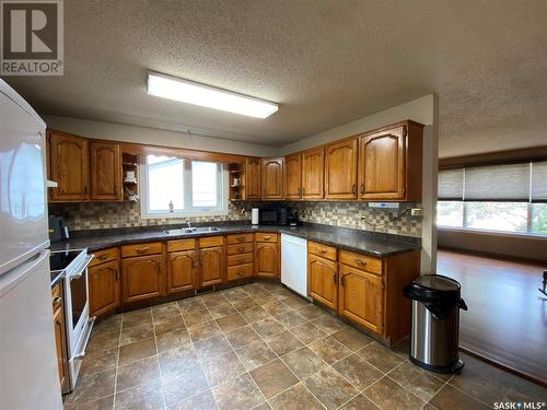 139 Stewart Crescent, Kindersley, SK - Indoor Photo Showing Kitchen With Double Sink