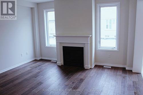 76 Cooke Avenue, Brantford, ON - Indoor Photo Showing Living Room With Fireplace