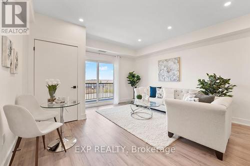 506 - 4 Spice Way, Barrie, ON - Indoor Photo Showing Living Room