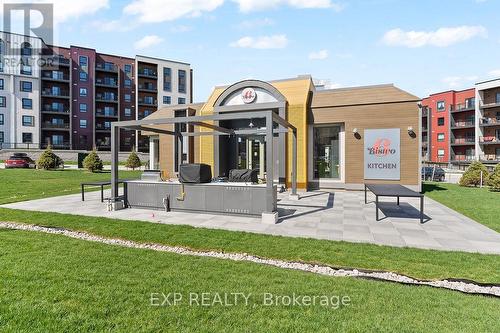 506 - 4 Spice Way, Barrie, ON - Outdoor With Balcony With Facade