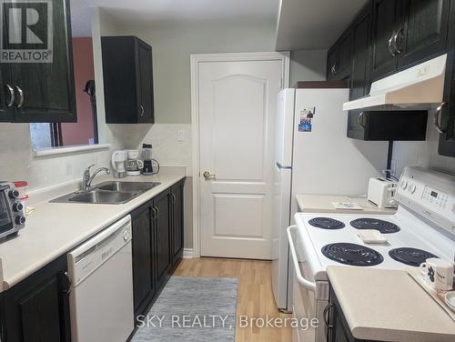 707 - 10 Dayspring Circle, Brampton, ON - Indoor Photo Showing Kitchen With Double Sink