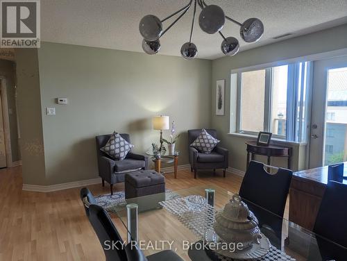 707 - 10 Dayspring Circle, Brampton (Goreway Drive Corridor), ON - Indoor Photo Showing Living Room