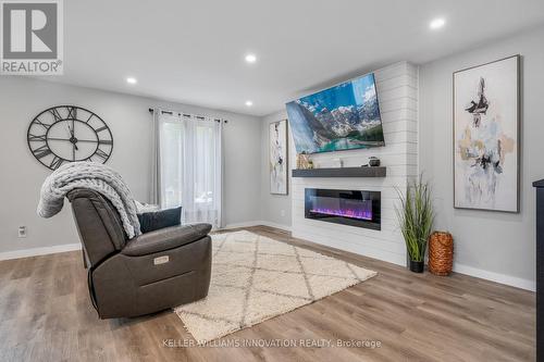 15 Miller Crescent, Norfolk, ON - Indoor Photo Showing Living Room With Fireplace