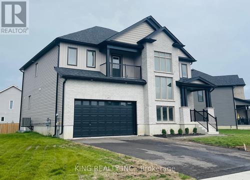 38 Allenwood Road, Springwater, ON - Outdoor With Facade