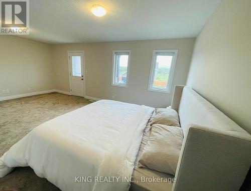 38 Allenwood Road, Springwater, ON - Indoor Photo Showing Bedroom