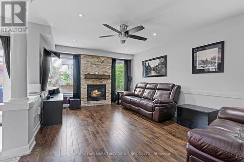 84 Bathgate Crescent, Clarington (Courtice), ON - Indoor Photo Showing Living Room With Fireplace