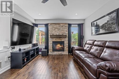 84 Bathgate Crescent, Clarington (Courtice), ON - Indoor Photo Showing Living Room With Fireplace