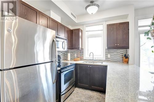 323 Winona Avenue Unit#405, Ottawa, ON - Indoor Photo Showing Kitchen With Double Sink With Upgraded Kitchen